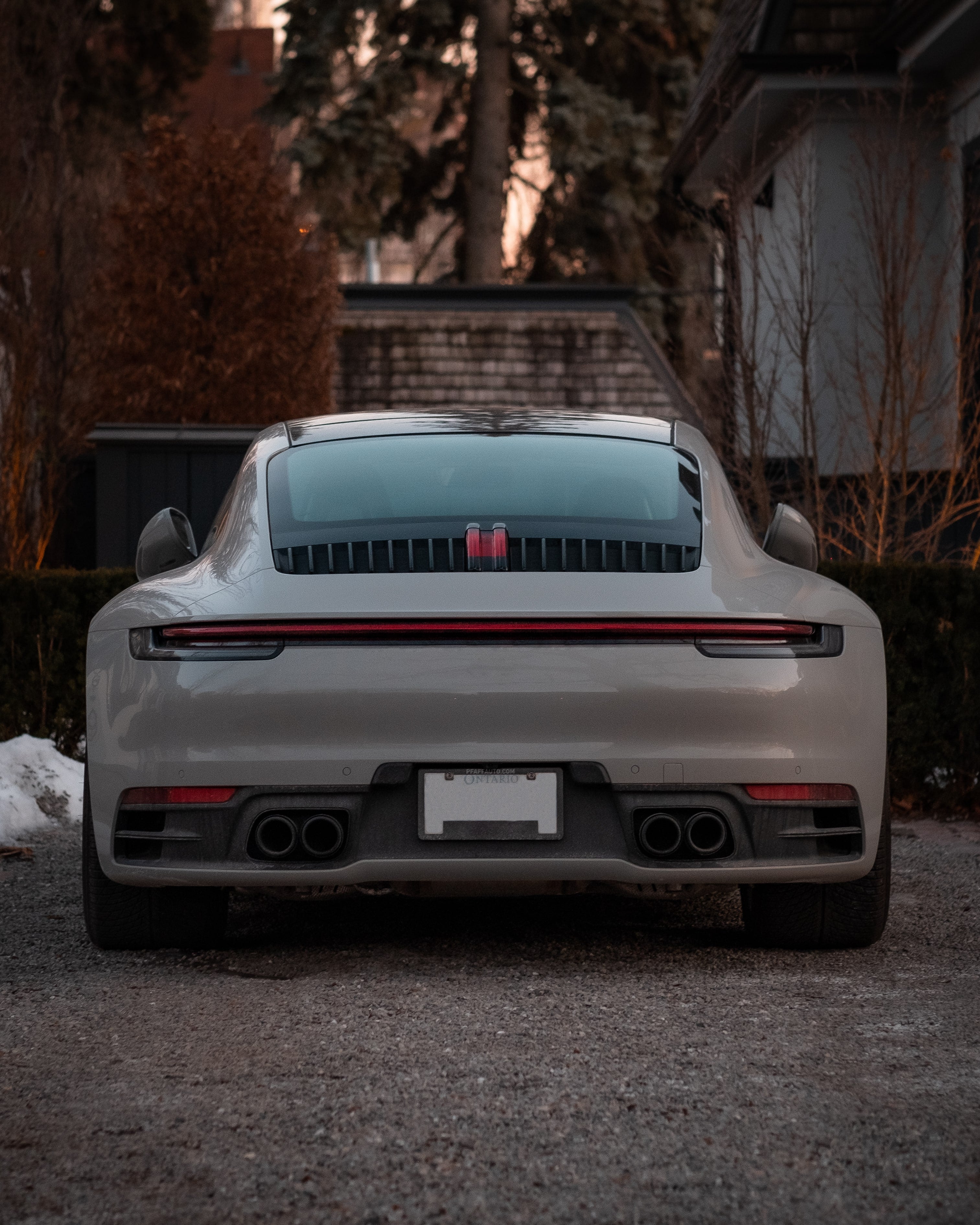 back-of-a-grey-sports-car-with-red-detail-2.jpg