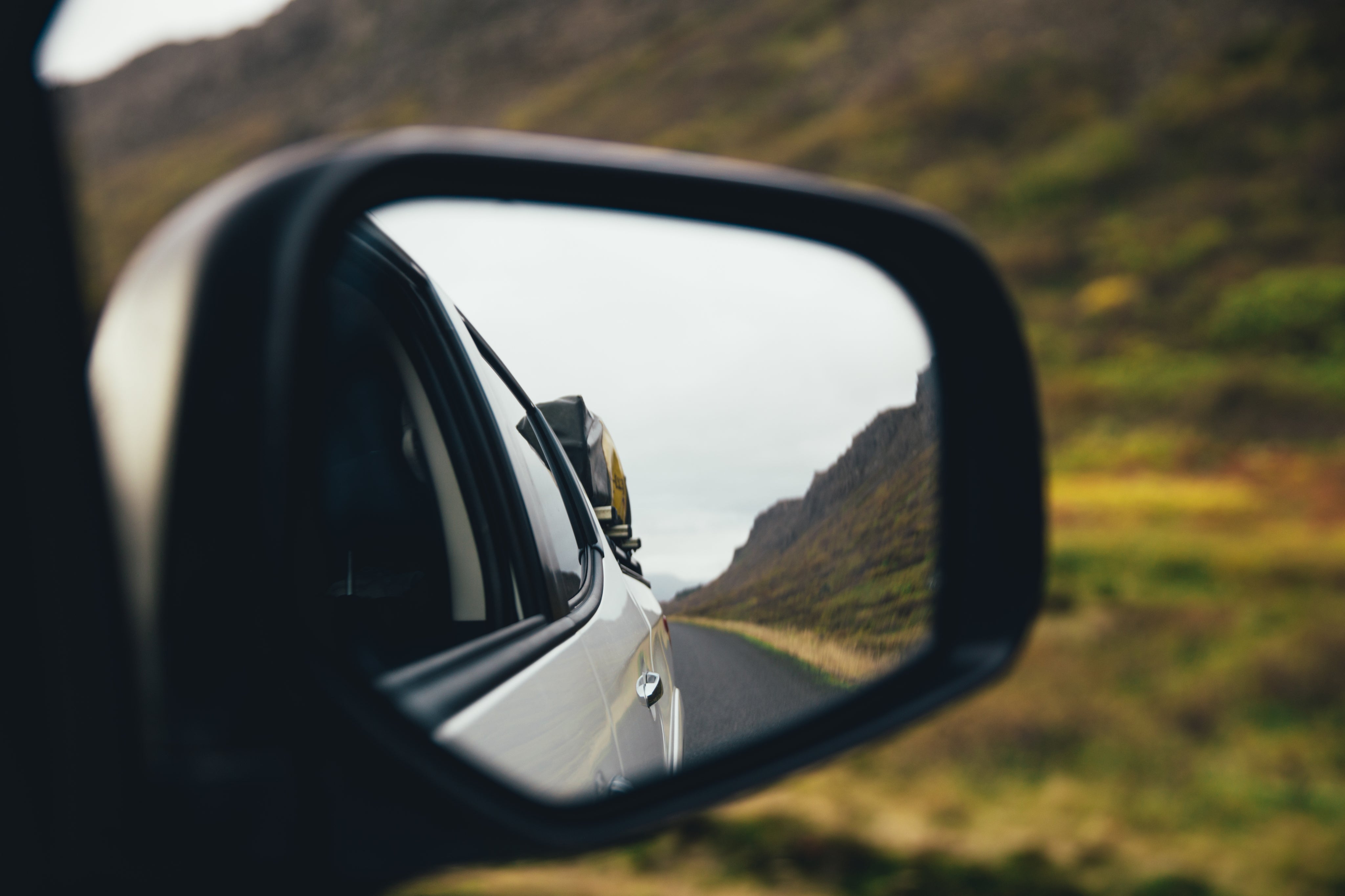 rear-view-mirror-on-highway.jpg